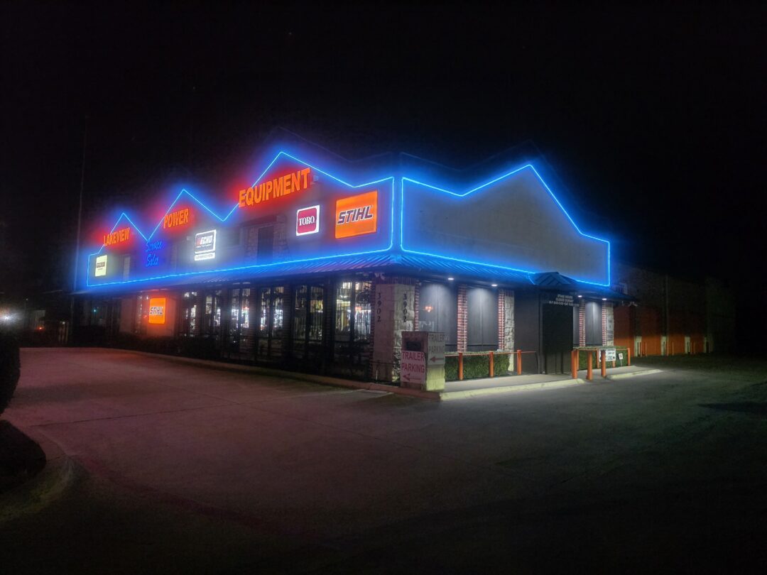 Precision Lighting commercial workshop lighting project in Royse City, Texas, featuring color-changing overhead and ceiling accent LEDs